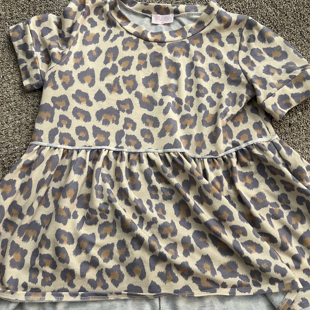 Pink Lily size small leopard peplum top